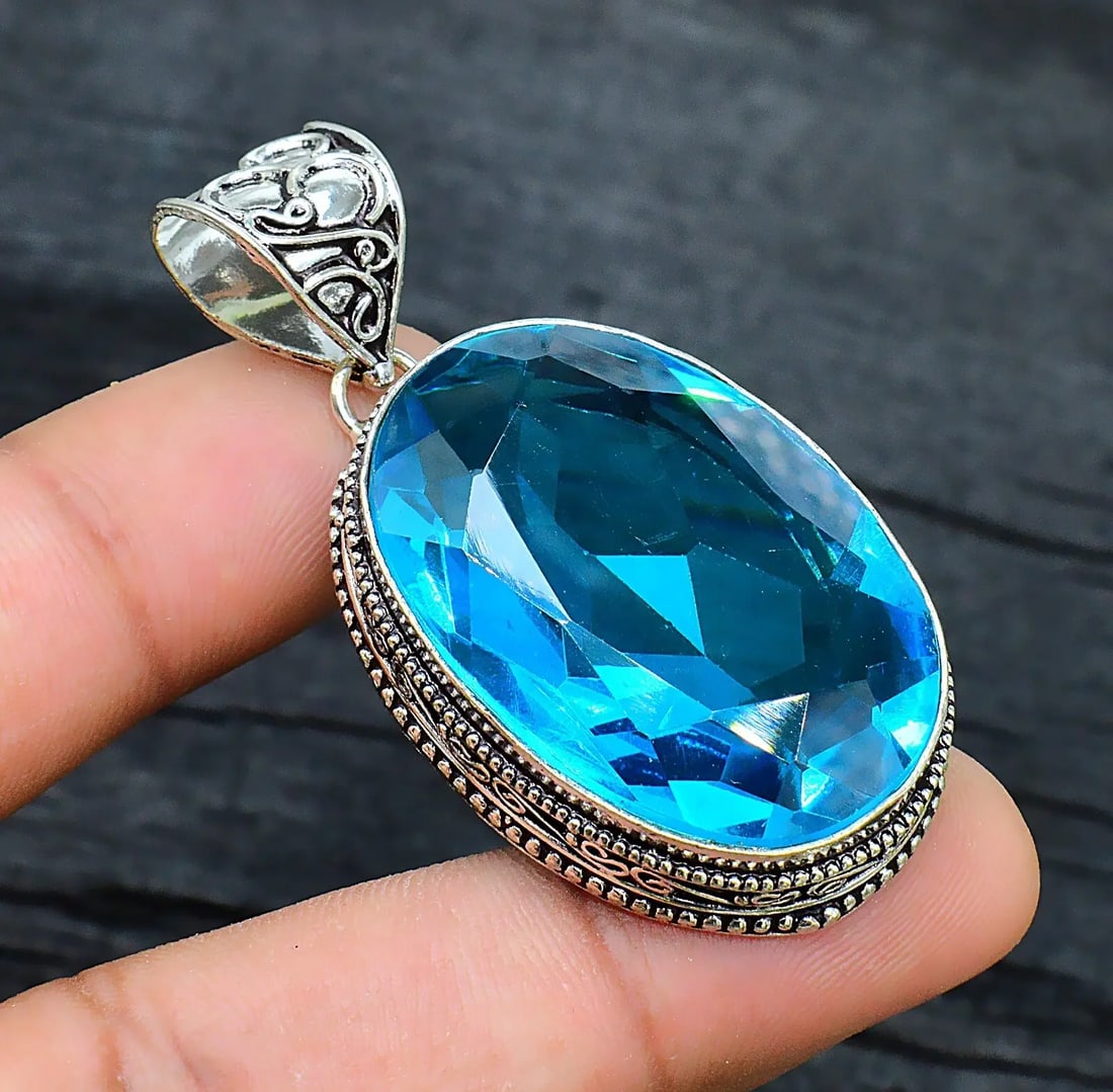 Exceptional Quality Blue Topaz Gemstone Handmade 925 Sterling Silver Jewelry Pendant Sz-2.2'': Our gemstones are organic, natural stones suitable for investment, collectors, and fine jewelry, each accompanied by an authentic certification. Our 925 silver pieces are rhodium-plated and finished w