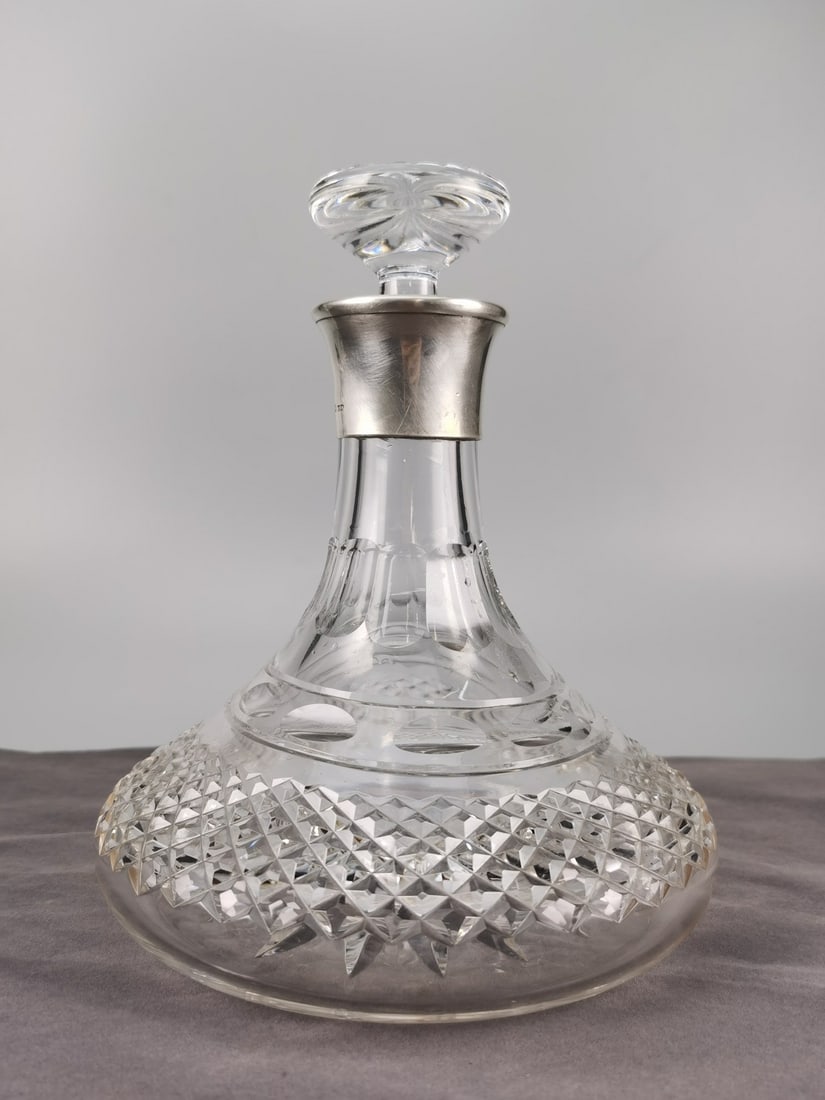 A BRITISH CUT-GLASS WINE DECANTER WITH STERLING SILVER COLLAR, 1956 (1 of 1)
