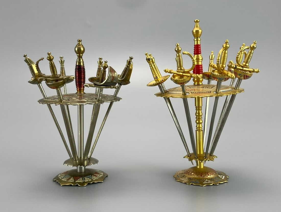 TWO SETS OF SPANISH SWORD-FORM FRUIT PICKS, CIRCA 1970S (1 of 3)