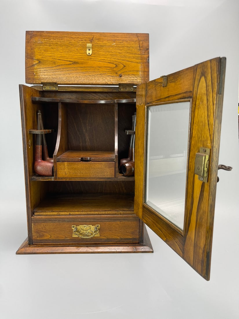 A SOLID OAK PIPE CABINET, 1925 - 3