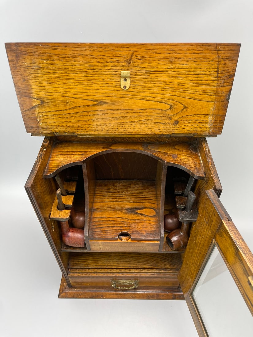 A SOLID OAK PIPE CABINET, 1925 - 4