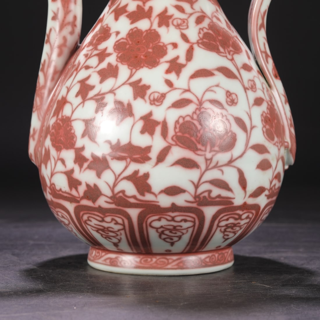 A UNDERGLAZED-RED 'INTERLOCKING FLOWERS' EWER - 4