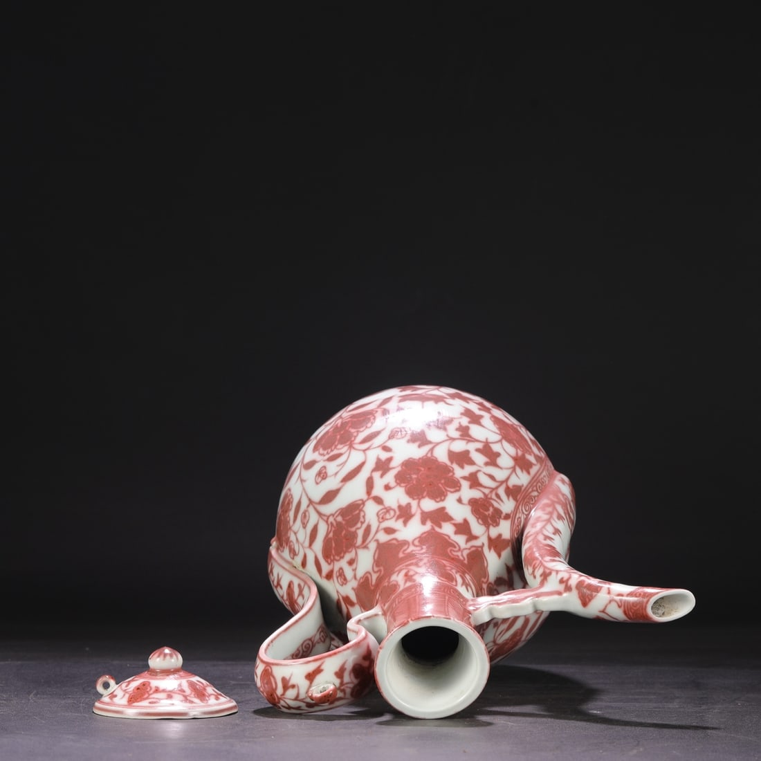 A UNDERGLAZED-RED 'INTERLOCKING FLOWERS' EWER - 5