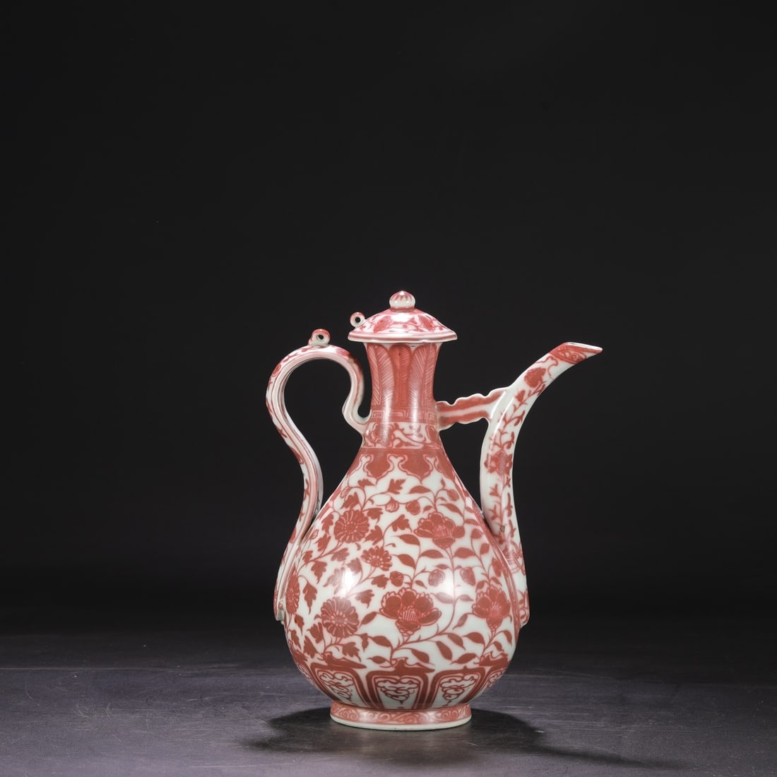 A UNDERGLAZED-RED 'INTERLOCKING FLOWERS' EWER - 7