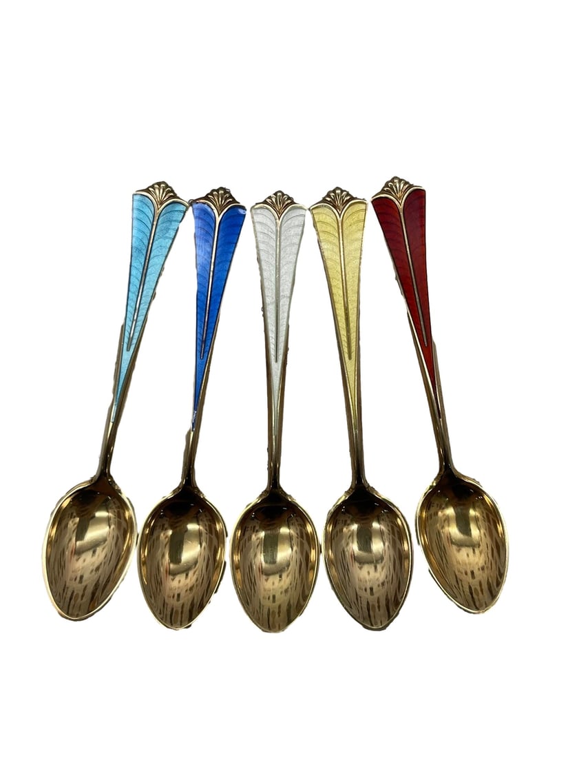 A SET OF NORWEGIAN STERLING SILVER-GILT AND POLYCHROME ENAMEL COFFEE AND PASTRY SPOONS, CIRCA 1950S (1 of 1)
