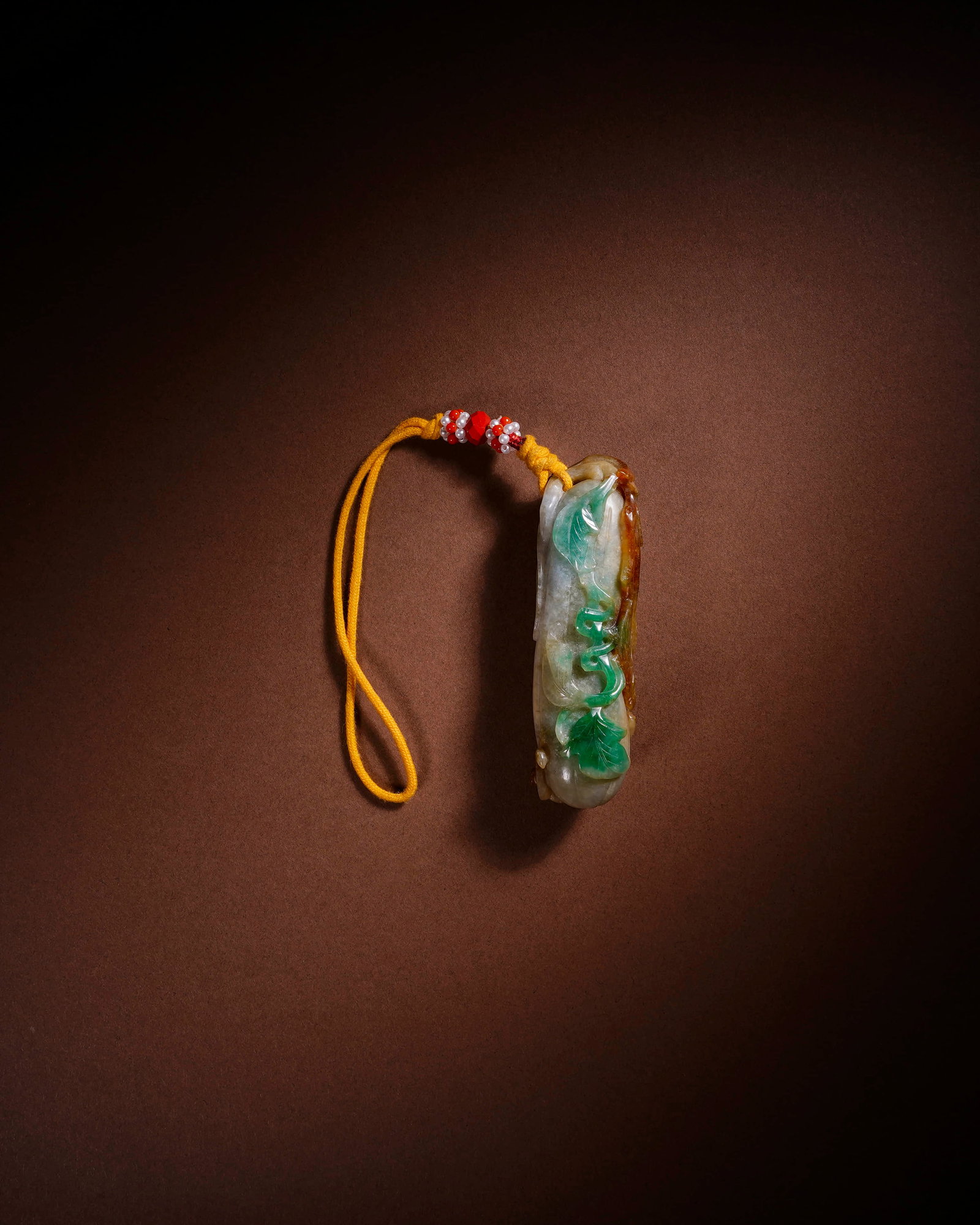 A JADEITE 'FU, LU, SHOU AND XI' HANDPIECE (1 of 4)