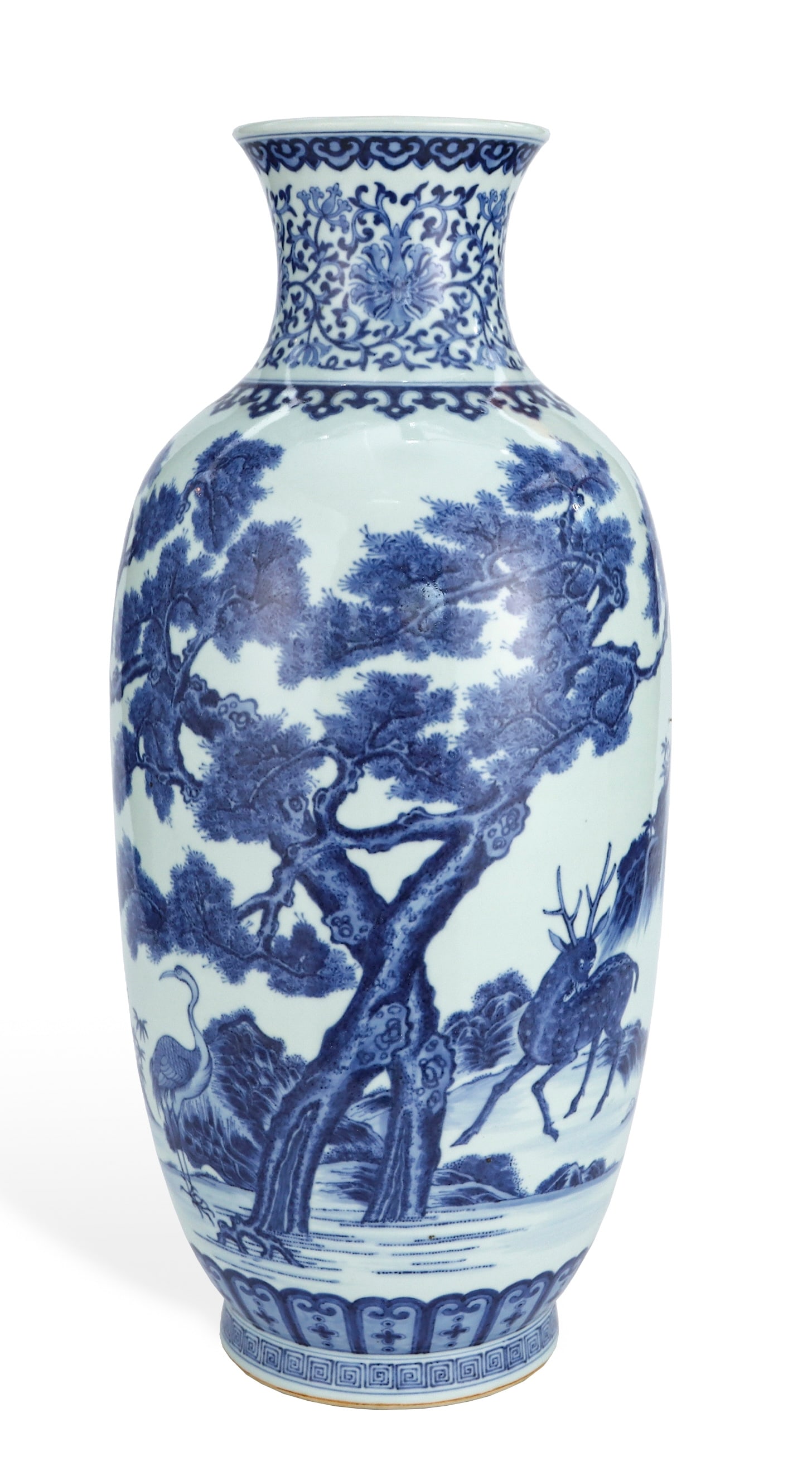 A BLUE AND WHITE 'CRANE, DEER AND SPRING' CLUB-SHAPED VASE: A BLUE AND WHITE 'CRANE, DEER AND SPRING' CLUB-SHAPED VASE Length: 24 cm (9.4 in.), Height: 53.7 cm (21.1 in.). All measurements are approximate.