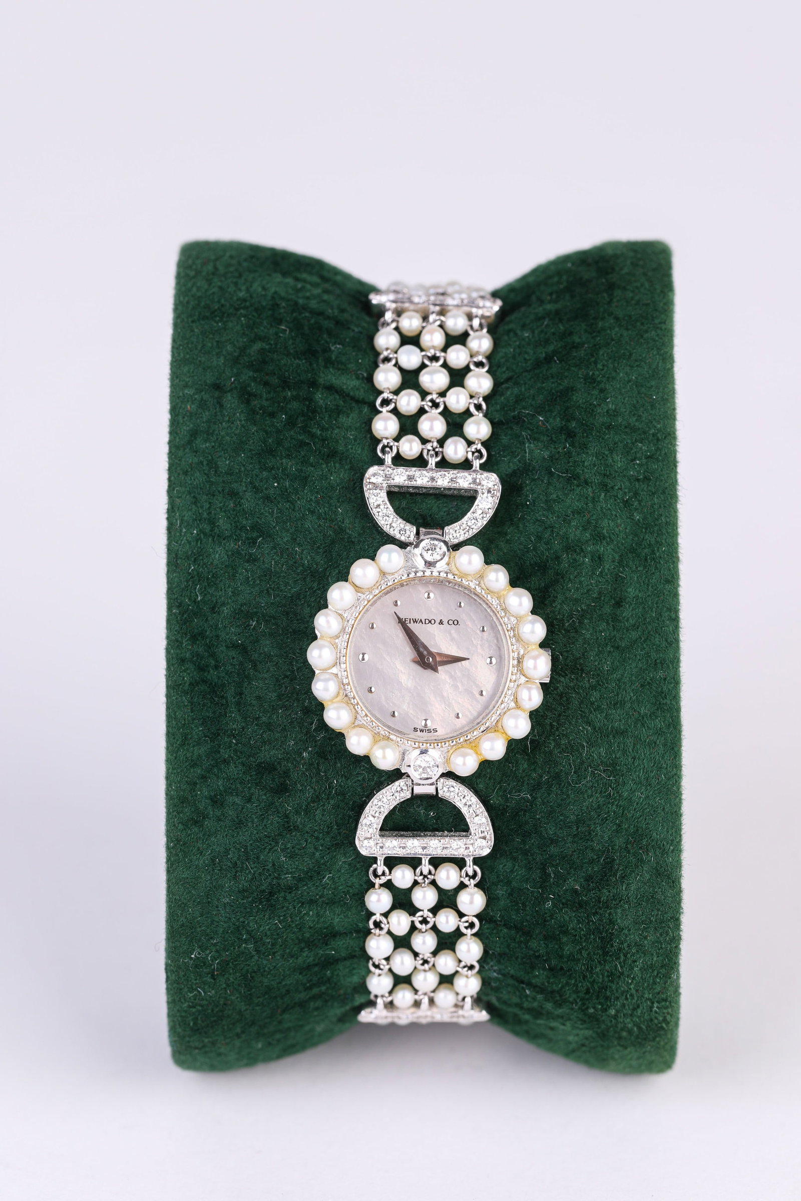 A HEIWADO PEARL AND DIAMOND POCKET WATCH CHAIN (1 of 4)