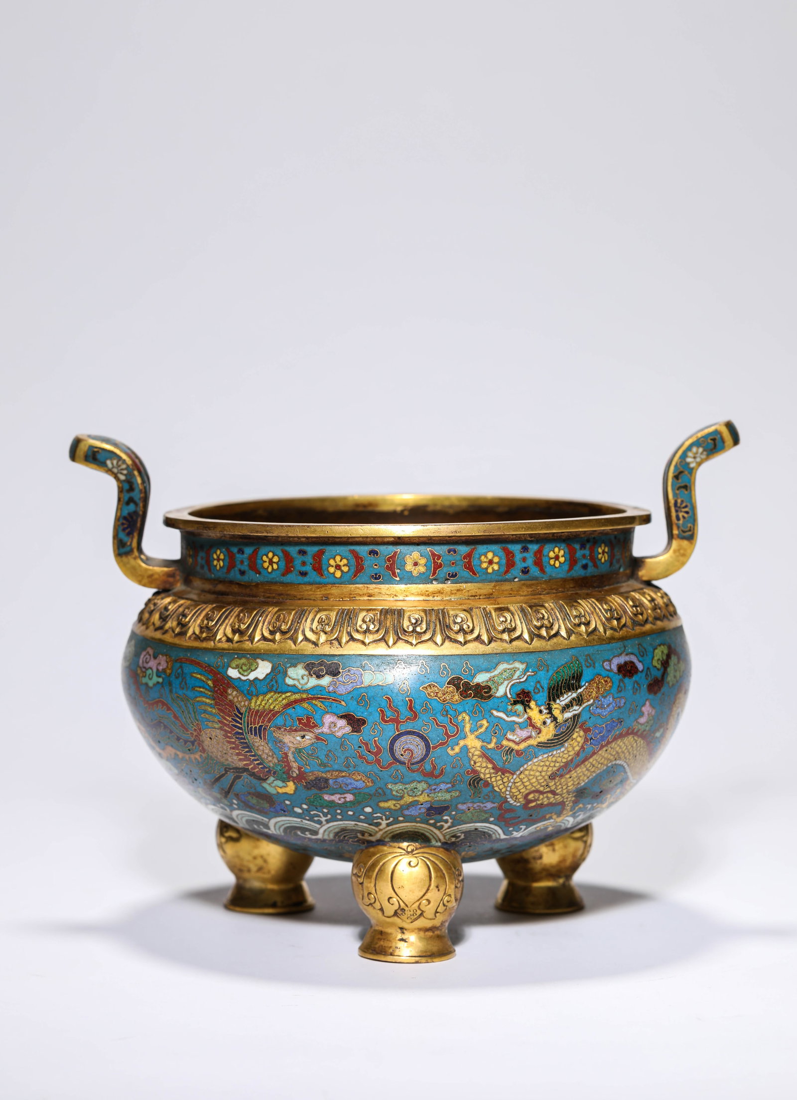 A COPPER-BODY CLOISONNé 'DRAGON AND PHOENIX' SKYWARD-HANDLED CENSER: A COPPER-BODY CLOISONNé 'DRAGON AND PHOENIX' SKYWARD-HANDLED CENSER Weight: 1415 g, Length: 21.2 cm (8.3 in.), Width: 18.2 cm (7.2 in.), Height: 15.5 cm (6.1 in.). All measurements are approximate.