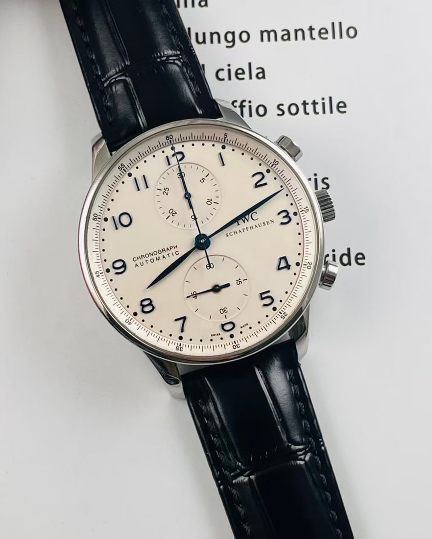 IWC PORTUGIESER CHRONOGRAPH MEN'S WRISTWATCH: IWC PORTUGIESER CHRONOGRAPH MEN'S WRISTWATCH IWC Portugieser Chronograph IW371417 men's watch, featuring elegant blued-steel feuille hands and Arabic numeral hour markers against a clean white dial,