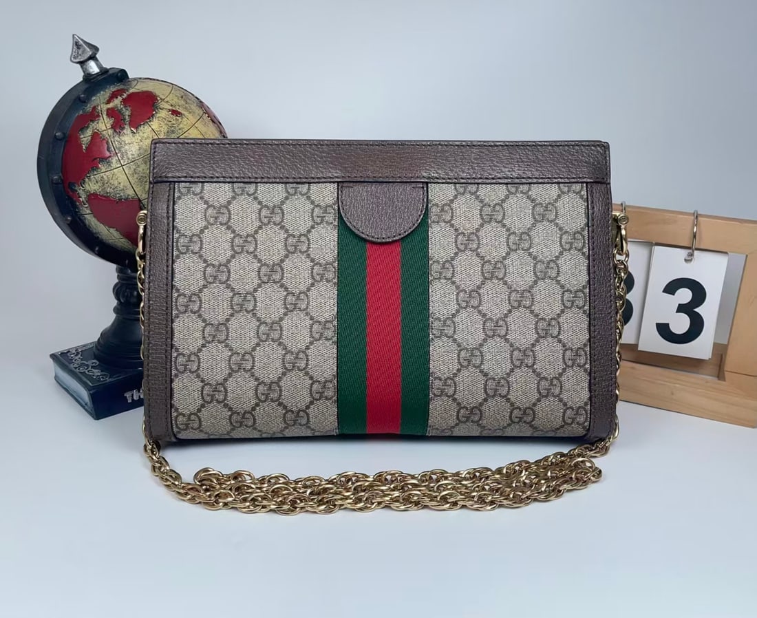 GUCCI OPHIDIA SMALL CHAIN CROSSBODY BAG: GUCCI OPHIDIA SMALL CHAIN CROSSBODY BAG Gucci Ophidia small chain crossbody bag, crafted from classic GG Supreme canvas and featuring the signature green and red Web stripe, Double G metal hardware, d