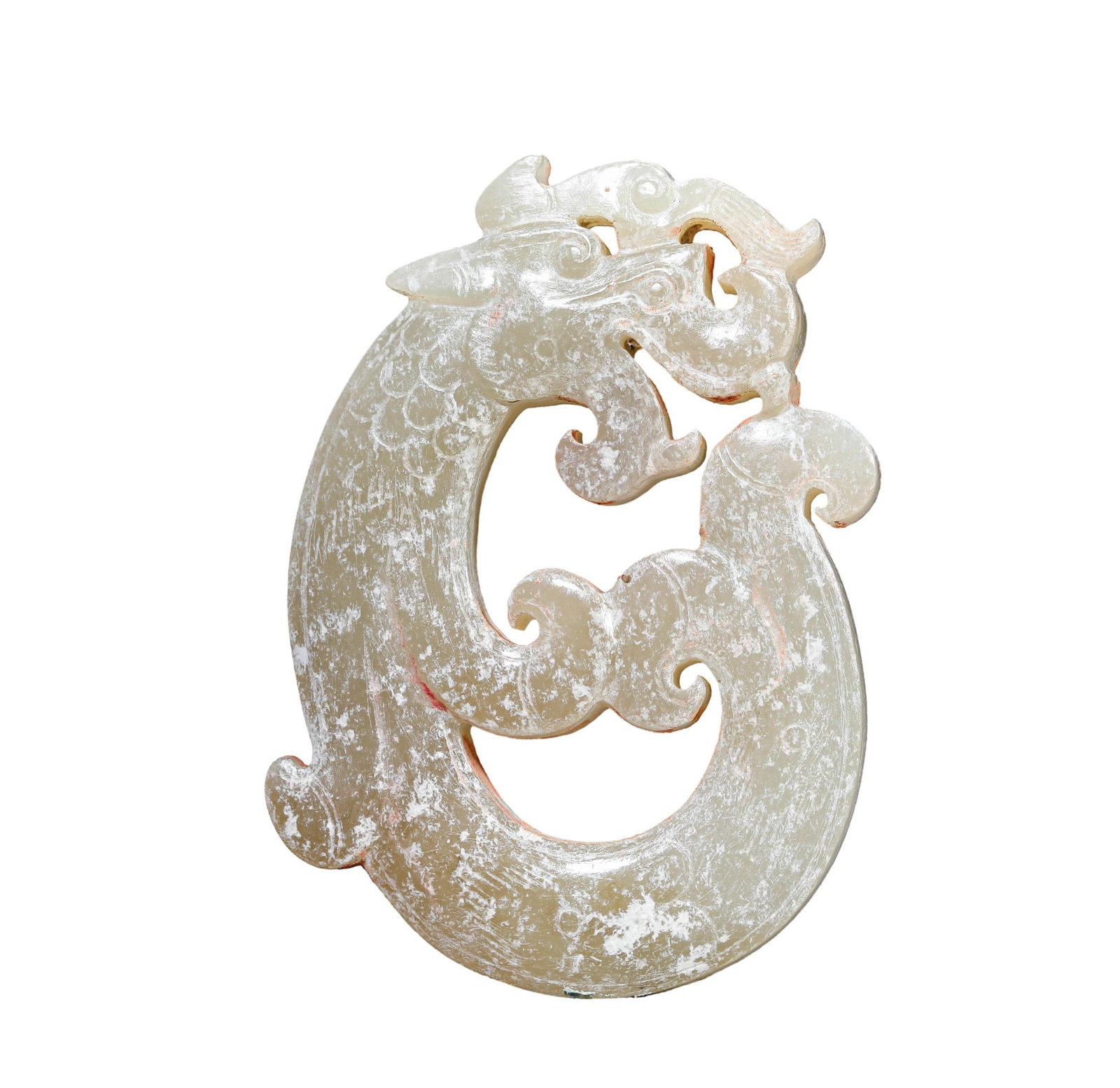 A JADE DRAGON: A JADE DRAGON Length: 3.6 cm (1.4 in.), Width: 0.8 cm (0.3 in.), Height: 5.1 cm (2.0 in.). All measurements are approximate.