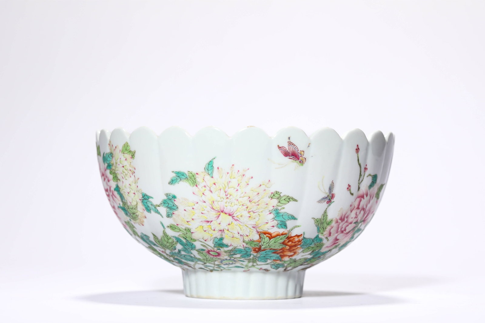 A FAMILLE ROSE 'FLORAL' MELON-RIBBED BOWL: A FAMILLE ROSE 'FLORAL' MELON-RIBBED BOWL Diameter: 15.2 cm (6.0 in.), Height: 8.2 cm (3.2 in.). All measurements are approximate.