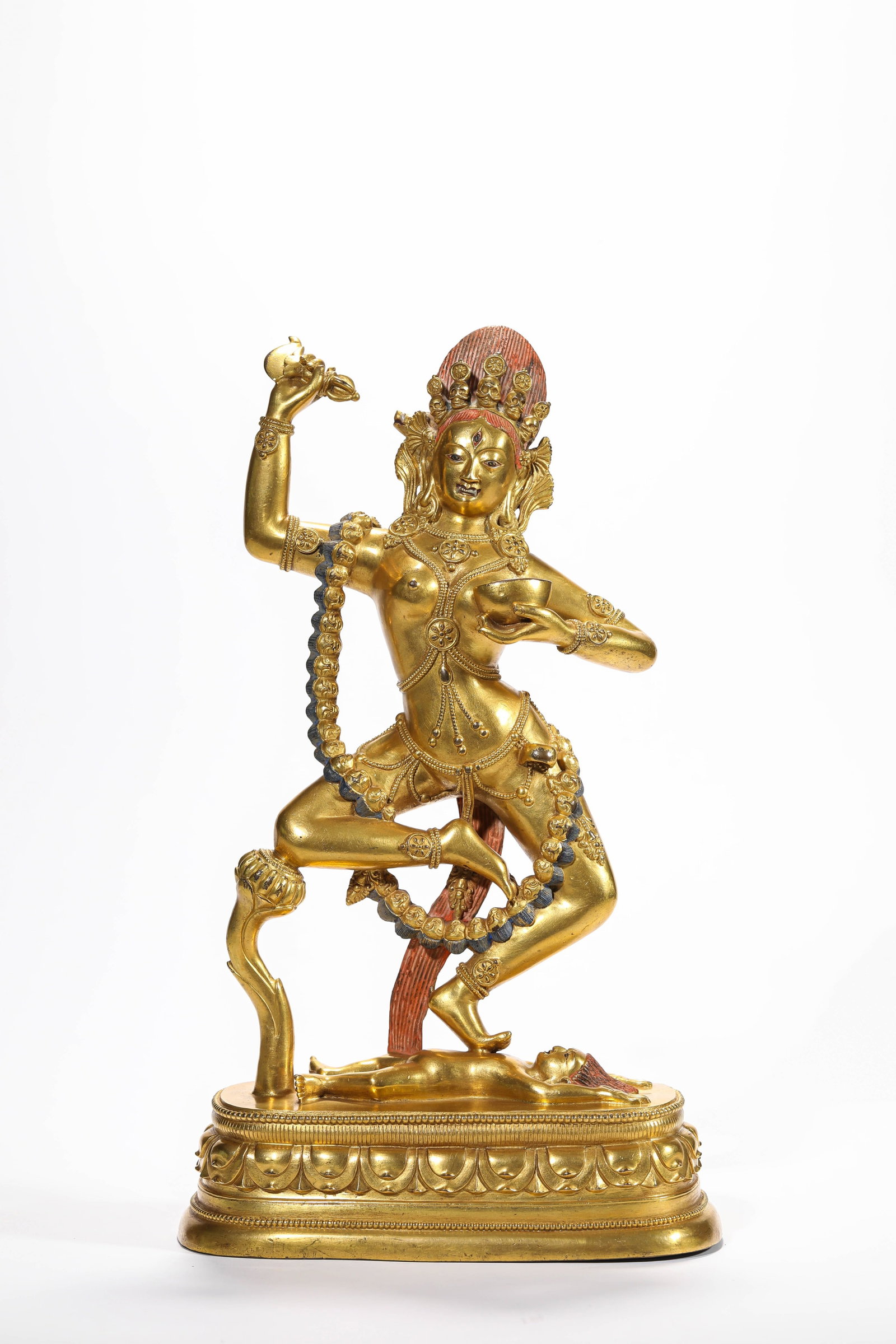 A GILT-BRONZE VAJRAVARAHI FIGURE: A GILT-BRONZE VAJRAVARAHI FIGURE Weight: 3.75 kg, Length: 19.8 cm (7.8 in.), Width: 9.3 cm (3.7 in.), Height: 33.3 cm (13.1 in.). All measurements are approximate.