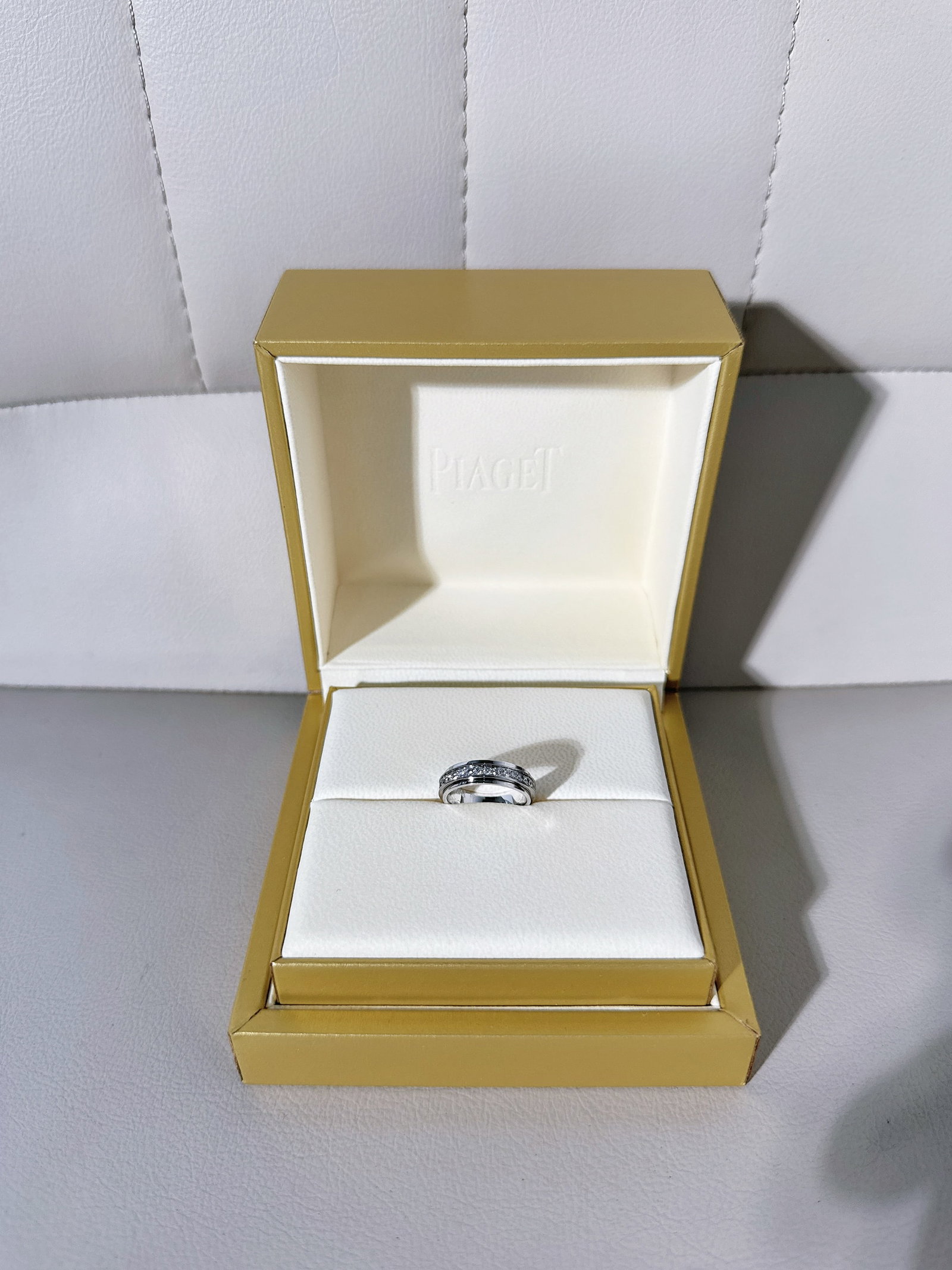 Piaget Possession 18K White Gold Brilliant-cut Diamonds Ring Size 47??US 4.5??: Piaget Possession ring. This iconic design is characterized by a central band that rotates freely between two outer gold borders.Key Product DetailsBrand: Piaget.Collection: Possession.Material: 18k w