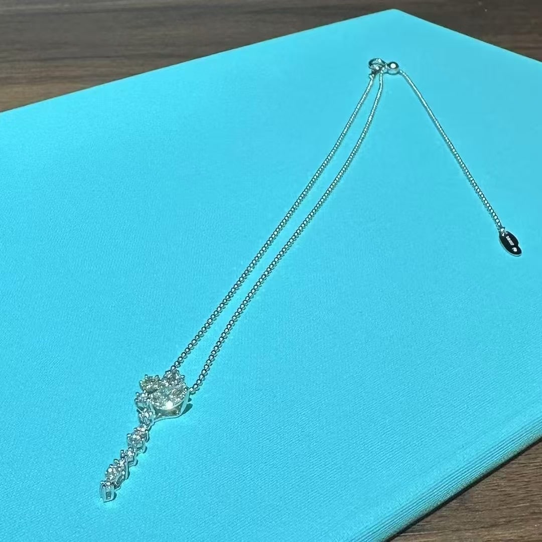 TASAKI Full Pave-Set Diamond Necklace: TASAKI Full Pave-Set Diamond Tassel NecklaceExquisitely beautiful and brilliantly sparkling. The tassel design creates a flattering vertical line, elegantly elongating the neckline. Features the lates