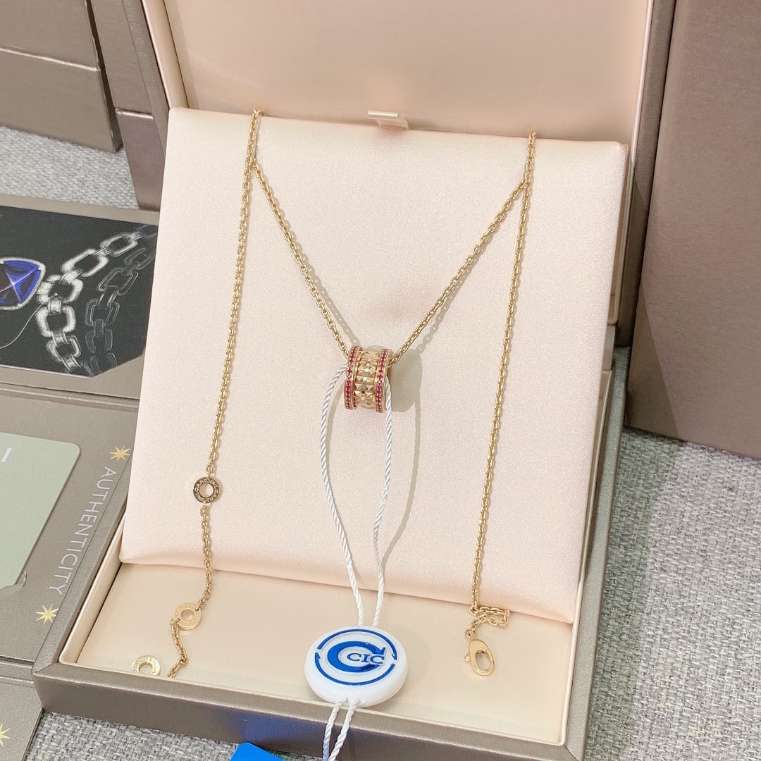 Bvlgari Pave Red Rubies 18kt Rose Gold B.zero1 Rock Necklace Limited Edition: B.zero1 Rock necklace by Bulgari (Bvlgari), specifically a 2021 limited edition model featuring double rows of red rubies.The design is a bold evolution of the classic B.zero1 collection, which draws 