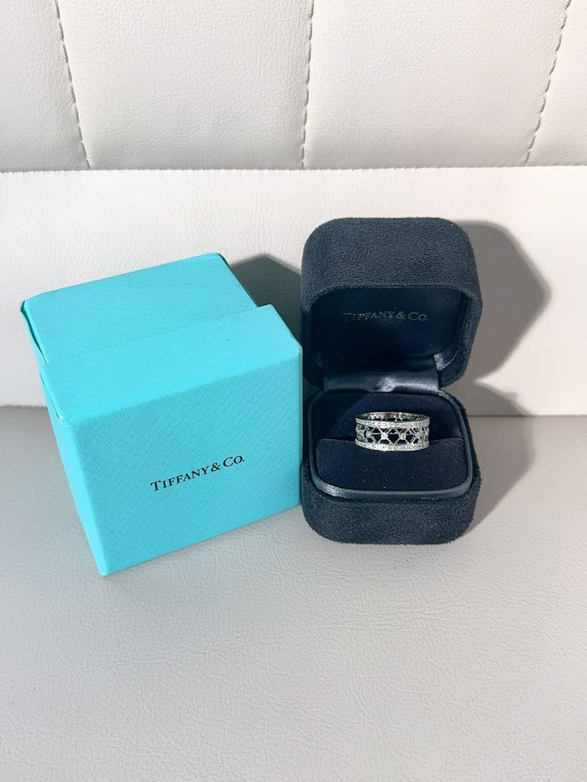 Tiffany & Co. White Gold Full Diamond Hollow Lace Window Ring, Size 55: Tiffany & Co. White Gold Full Circle Diamond Hollow Lace Filigree Ring, Size 55.Pave diamonds all around the band, extremely beautiful, discontinued and rare collectible piece, hard to come by.Accesso