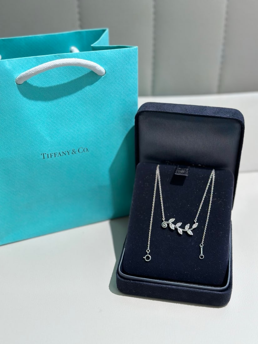 Tiffany & Co. Paloma Picasso Olive Leaf Diamond Necklace: Tiffany & Co. Paloma Picasso? Olive Leaf Vine Diamond NecklaceDesign: Unique horizontal olive leaf motif, fully pave-set with brilliant diamonds (extra sparkly).Metal: 18K gold/rose gold (as preferred