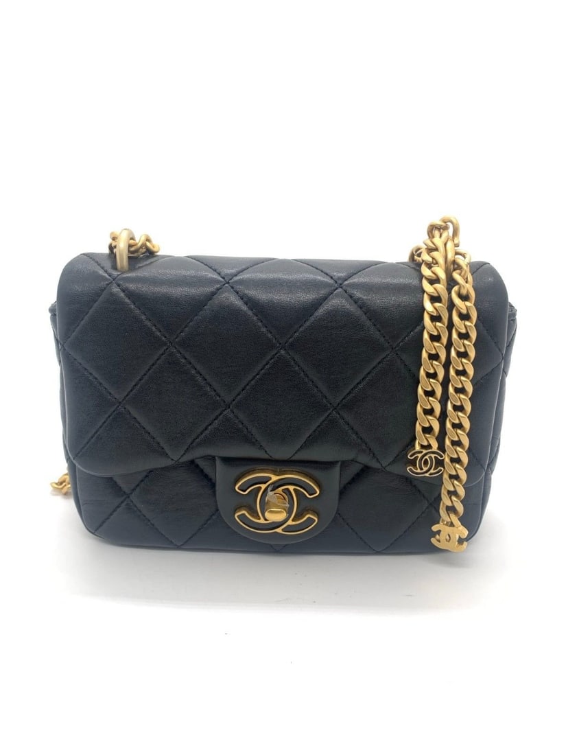 Chanel Black Leather Flap Bag Enamel CC Buckle Charms Chain Shoulder Bag w/ chip: Minor signs of use, scratches on hardware, chain wear, clean inside and out.