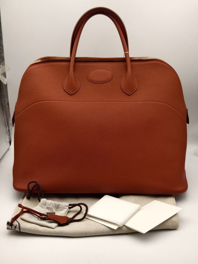 HERMES Bolide 45 Travel Bag Orange Leather Stamp X Silver Hardware Authentic: Normal signs of wear, corner scuffs, minor leather damage in a small area, hardware scratches, and clean interior.