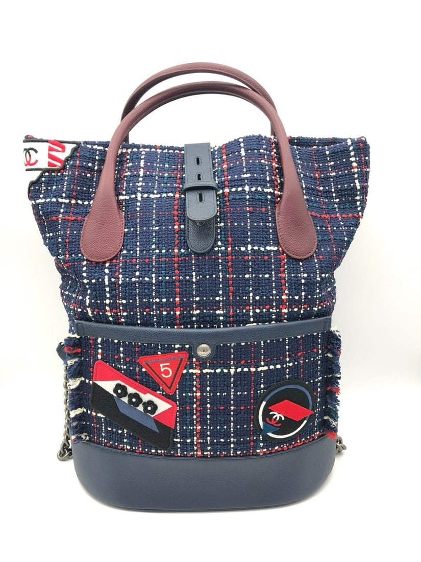 chanel airlines Tweed trip backpack blue tote bag Origin Italy: The condition is good, the interior is clean, there are slight signs of use, and the retro hardware has slight scratches