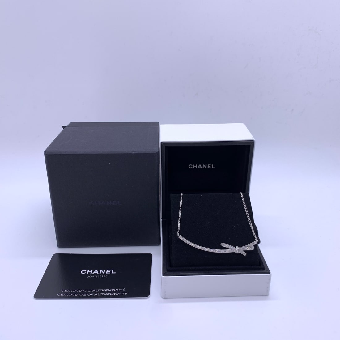 Chanel Ruban Bow Necklace 18K white gold with diamond pave: Chanel Ruban Bow Necklace 18K white gold with diamond pave??Minor signs of normal wear