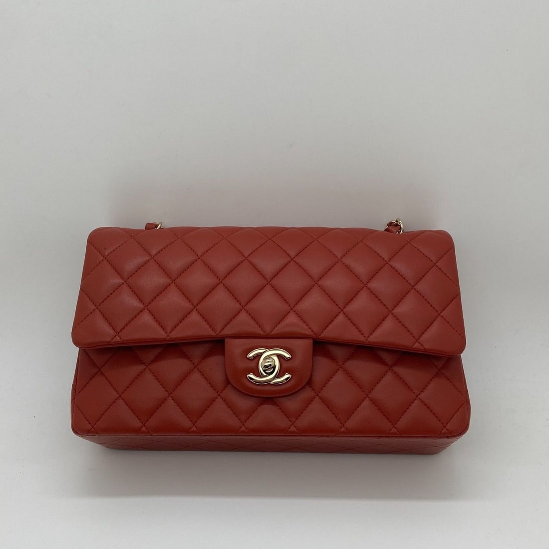 CHANEL Classic Double Flap Bag Quilted Lambskin Medium Red GHW Chip: Slight signs of use, chain wear, clean inside and out.