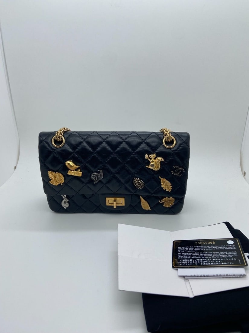 Chanel Lucky Charms 2.55 Reissue Flap Bag Aged Calfskin Quilted 225 Italy Rare: Minor signs of use, scratches on the hardware, wear on the chain, and clean both inside and out.
