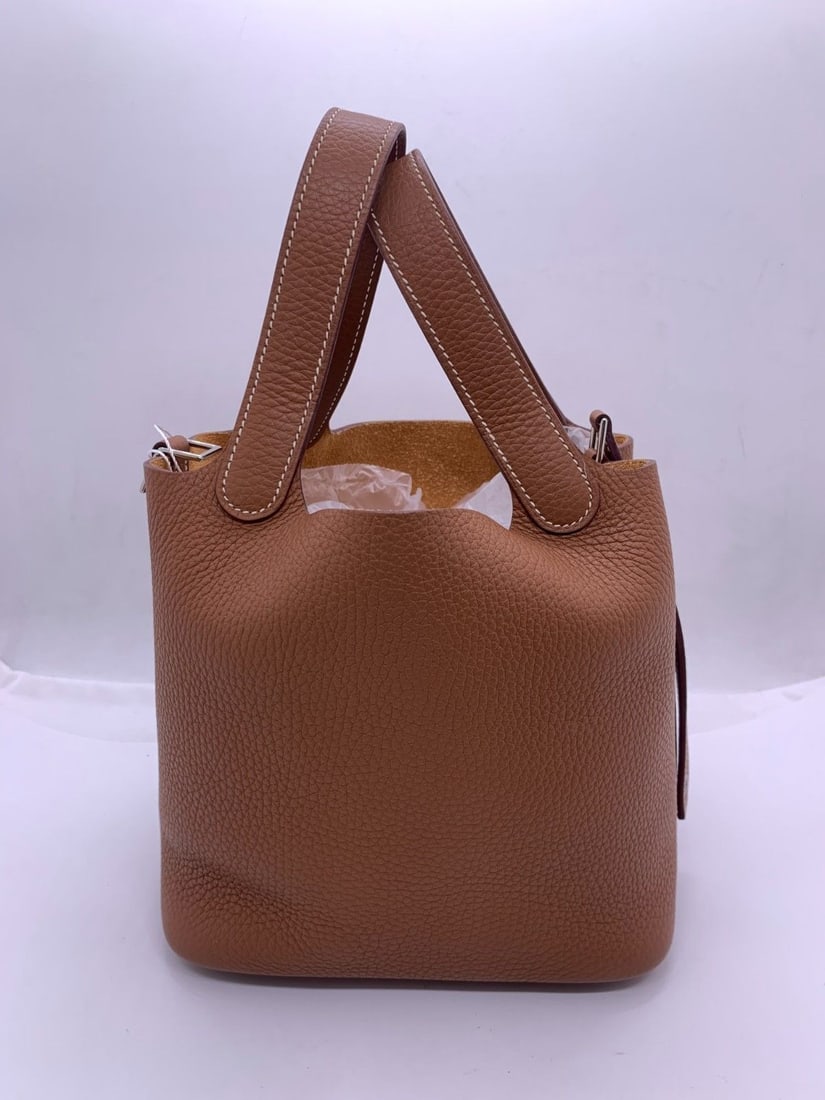 Auth Hermes Picotin Lock PM 18 Bag Brown Leather Stmap K Origin France: Minor signs of use, light scratches on hardware, clean interior.