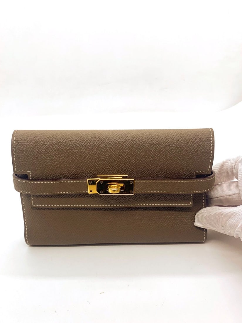 Hermes Kelly Classique Medium Wallet Epsom Leather Origin France: Normal signs of use, corner wear, scratches on hardware, clean interior.