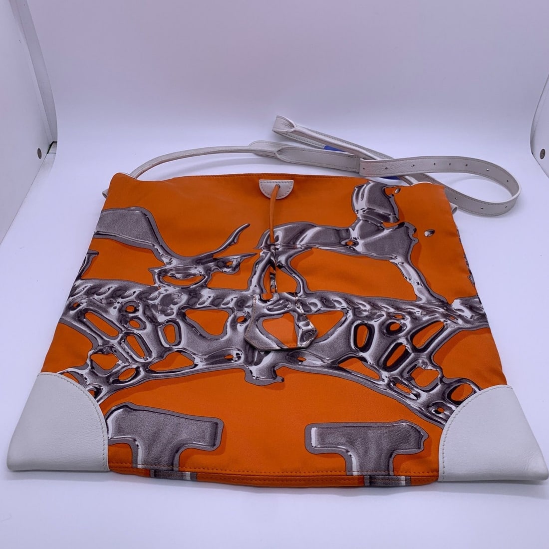 Hermes Silky City 33 Vif Argent Orange Silk Leather White Bag PHW W/ Pouch: Condition: Normal signs of daily use. Hardware has scratches; fabric surface shows slight wear and minor dirt. Edge coating has cracking, and corners are worn.Accessories: No Accessoriessize: Width:33