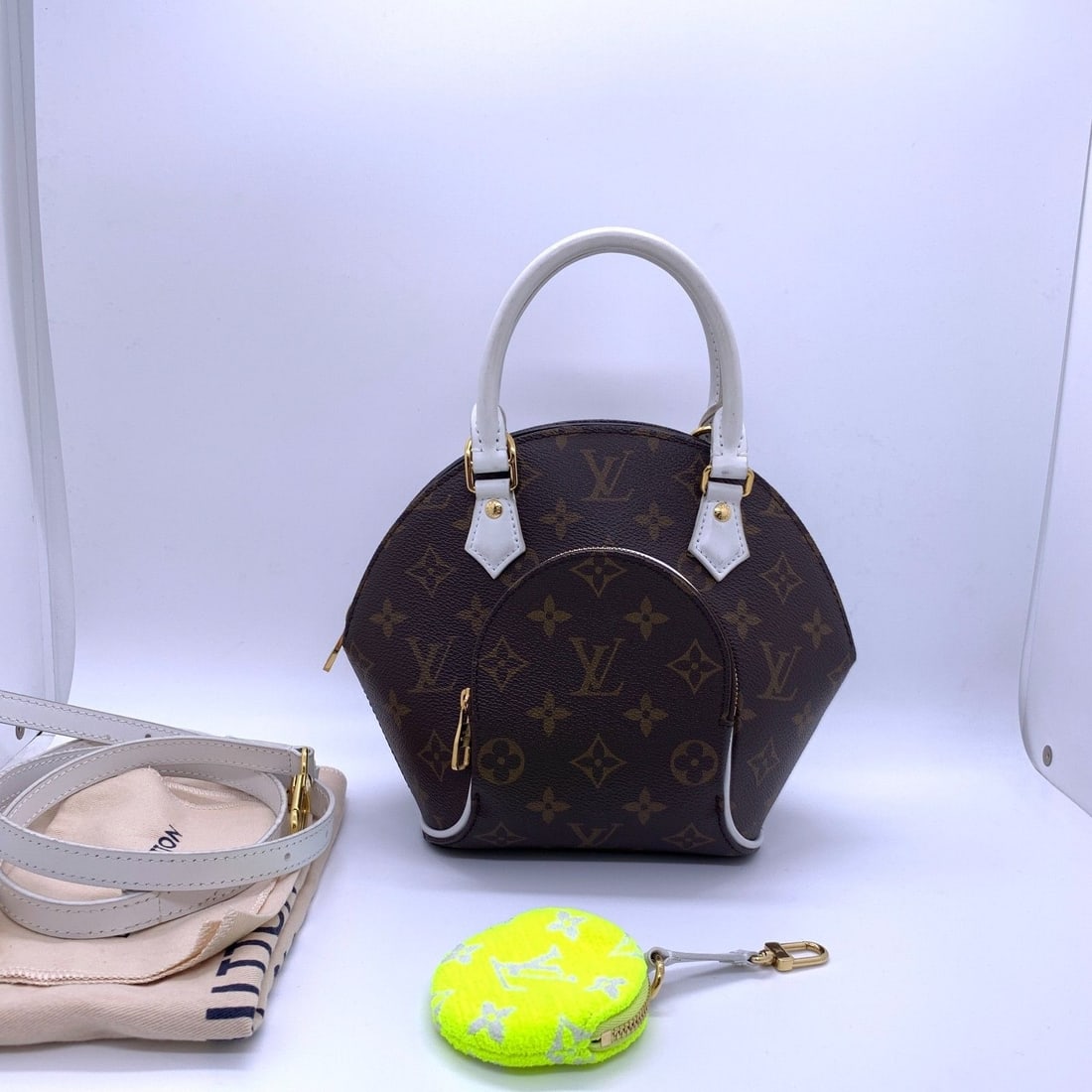 Louis Vuitton LV Match Ellipse BB Monogram Canvas Bag M20752: Condition: Normal signs of use: wear on the handle and shoulder strap, scratches on hardware, clean inside and out.Accessories: Dust bag,shoulder strap,coin pursesize: Width:18cm,height:17cmDesigner: 