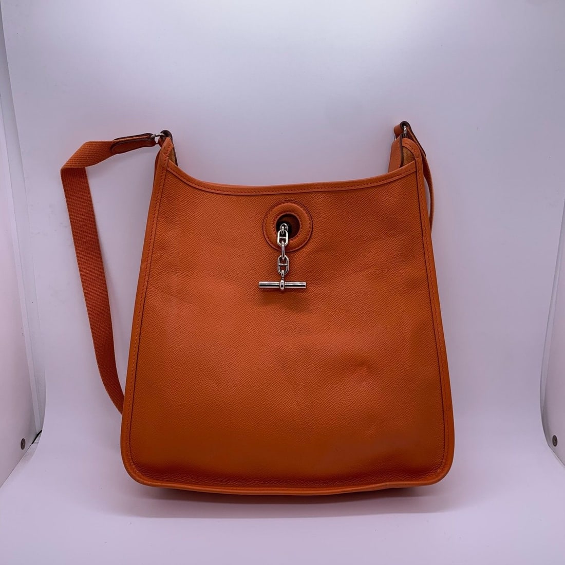 Hermes Vespa PM Orange Leather Silver Tone HW Crossbody L Stamp: Condition: There is color touch-up on the corners; slight scratches, indentations and darkening on the bag body; scratches and oxidation on the hardware.Accessories: No Accessoriessize: Width:28cm,hei