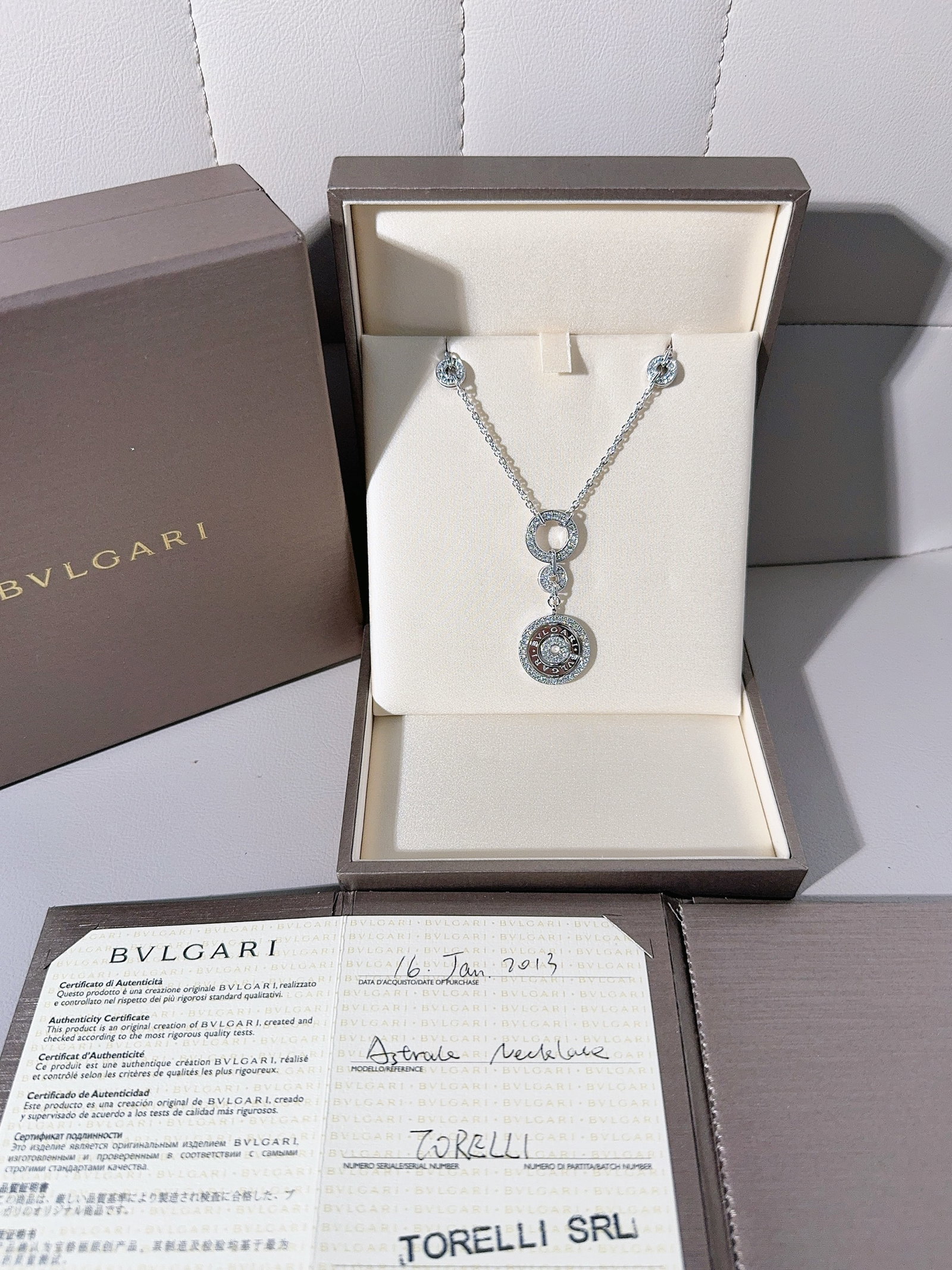 Bvlgari Astrale Cerchi 18k White Gold Brilliant-cut Diamonds Pendant Necklace: Bvlgari Astrale Collection "Circle of Fortune" Diamond Necklace in White Gold,Purchased in 2013, vintage model without serial code,Accessories: Original box + warranty card
