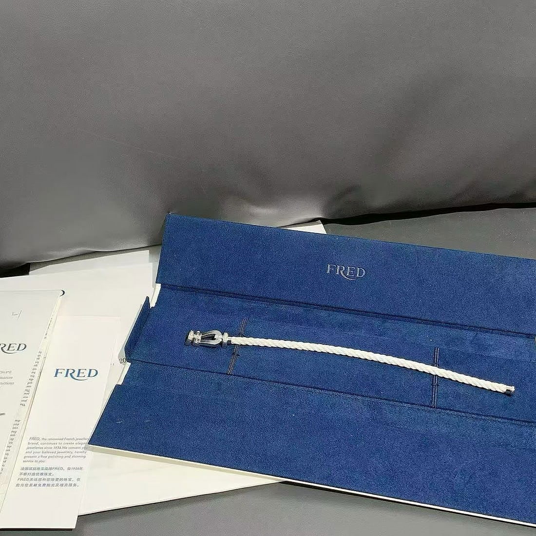 FRED Force 10 Nautical Clasp Bracelet Platinum, Half-Diamond, Size 18: Authentic FRED Force 10 large bracelet, crafted in 18K platinum (750??). Features iconic nautical horseshoe clasp with half-pave brilliant-cut diamonds . Size 18 (fits 18cm wrists), designed with dual