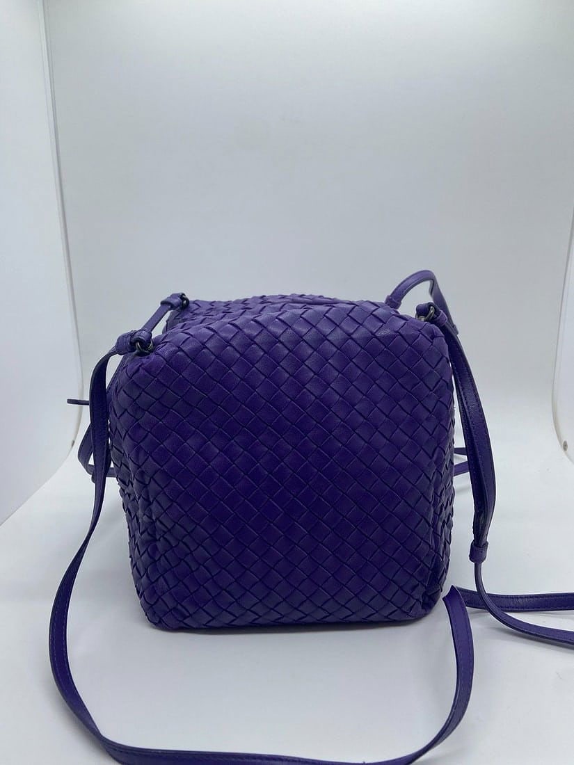 Bottega Veneta Nappa Intrecciato Cube Crossbody Bag Purple Leather Italy: Normal signs of wear, scratches on the hardware, clean interior, worn and darkened corners, and small areas of damage on the leather.