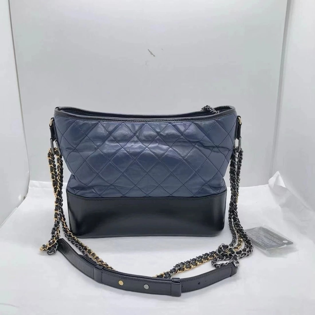Chanel Medium Gabrielle Hobo Bag Navy Blue Black Aged Calfskin: "ITEM SPECIFICATIONSConditionNormal wear: hardware scratches & chain abrasion, clean inside and out.AccessoriesID cardSizeWidth: 27m, Height: 23cmDesignerChanelModelMedium GabrielleExterior MaterialLe