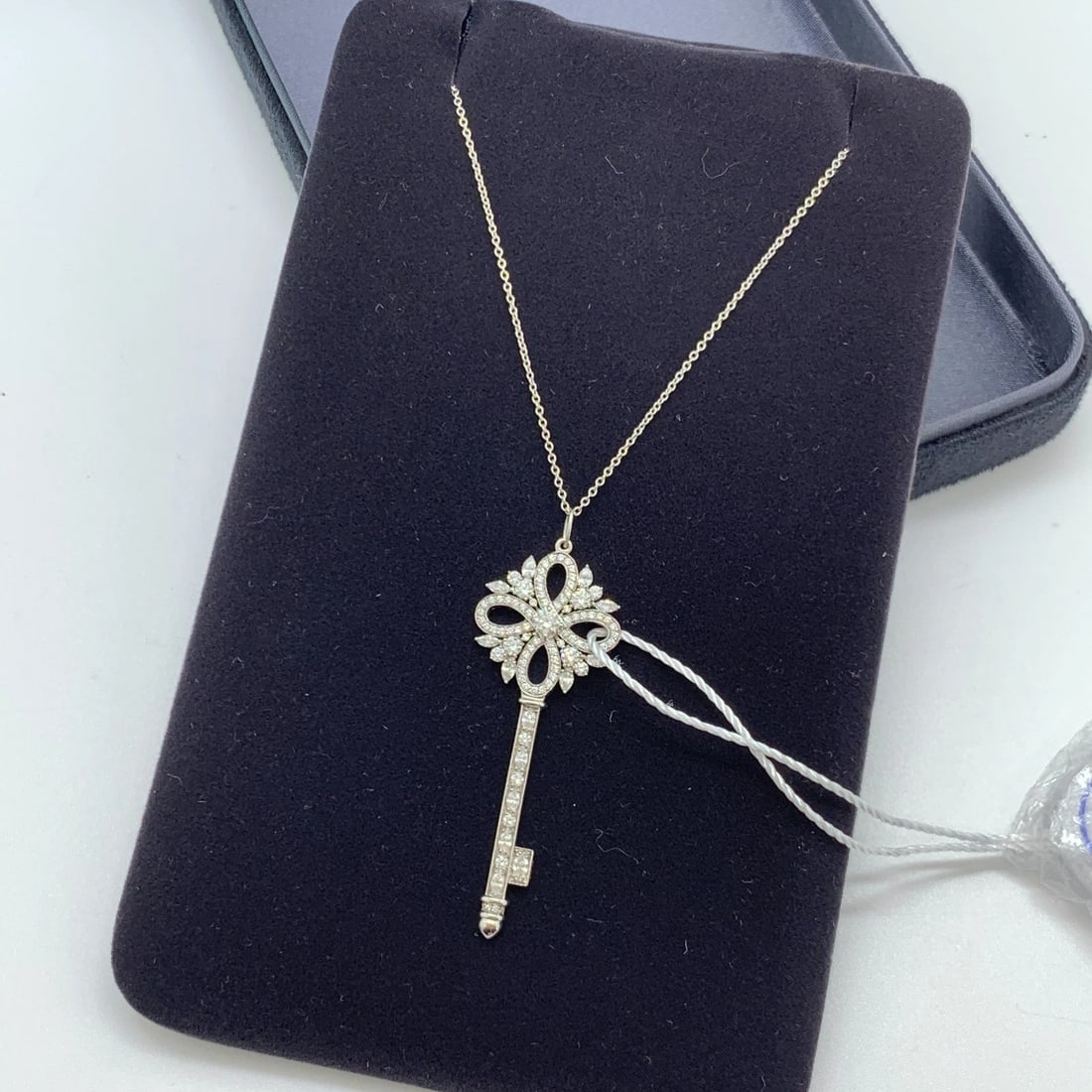 Tiffany & Co. Victoria Diamond Key Pendant Necklace Platinum: Condition Normal wear and tear, surface scratches Accessories Box Weight 9.5g Designer Tiffany