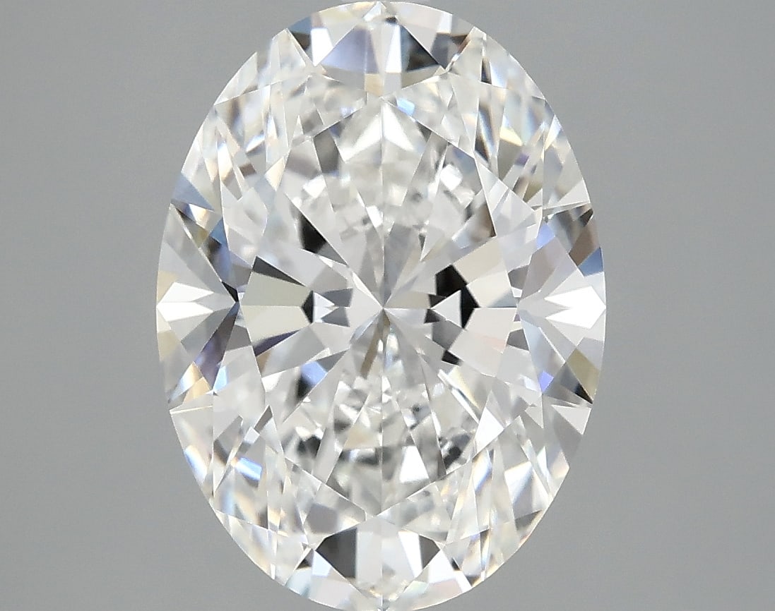 OV 4.06 E VVS2 - EX EX IGI Certificate Laboratory Grown Diamond: this Oval Brilliant laboratory-grown diamond has a weight of 4.06 carats and is classified as Color Grade E with a VVS 2 clarity grade. The gemstone features Excellent polish and symmetry ratings and 
