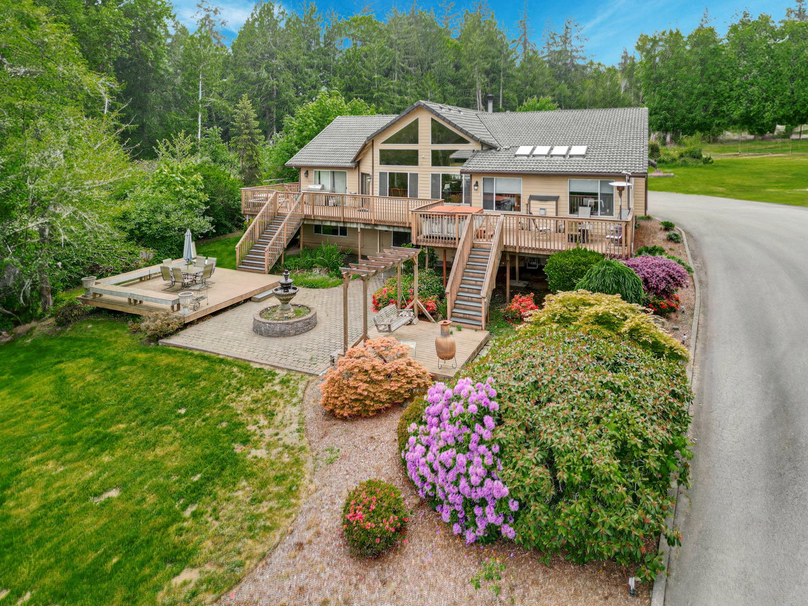 Pacific Northwest Luxury Estate with Private Acreage and Skyline Views: Presenting an extraordinary Pacific Northwest estate offering nearly 5000 square feet of refined living space on 4.81 acres of stunning grounds with sweeping views of the Puget Sound, Seattle skyline,