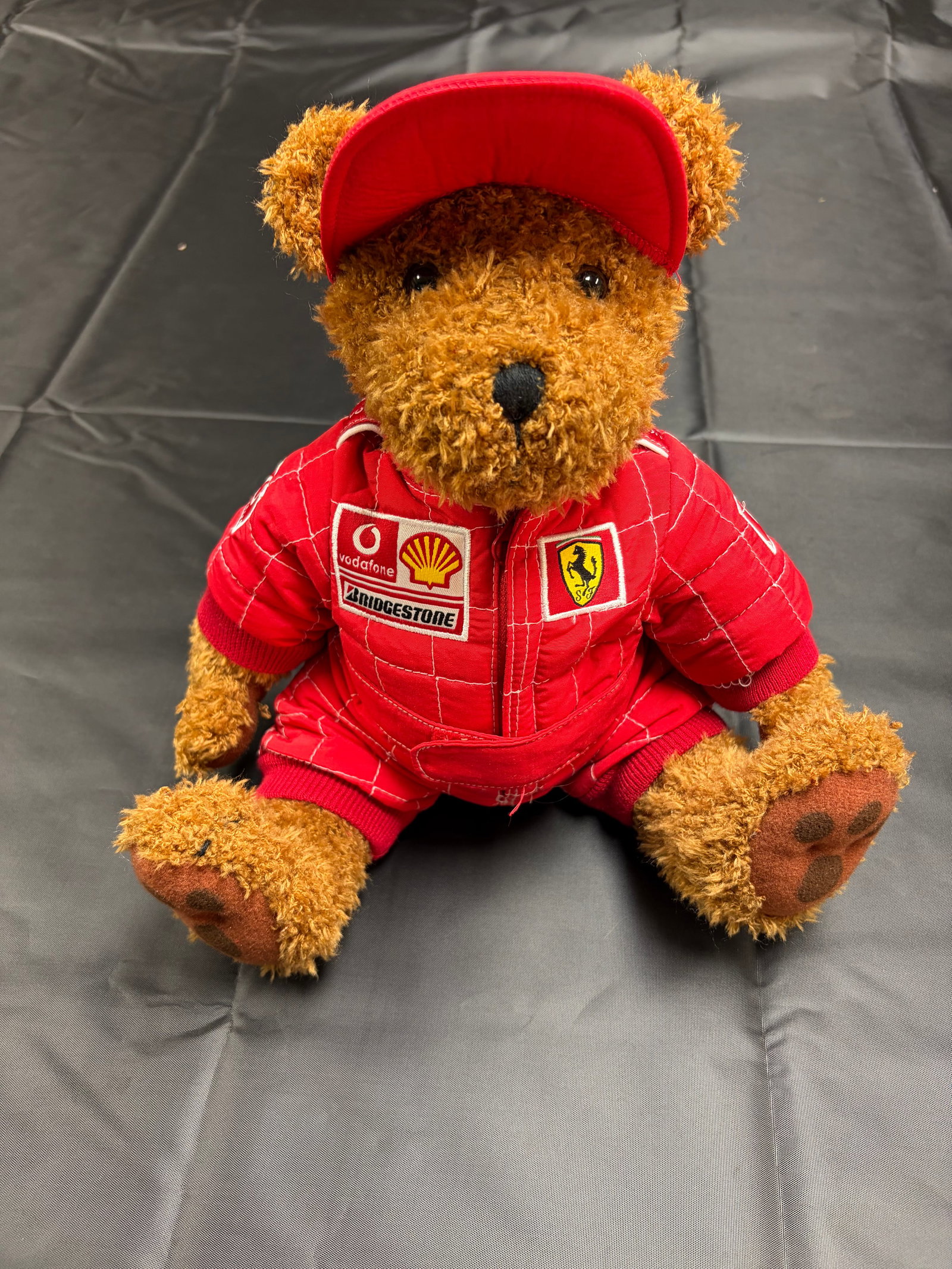 Ferrari Bear: This unique Ferrari Bear is a fun and collectible display piece featuring iconic Ferrari inspired styling and design. A great addition for automotive enthusiasts collectors of branded memorabilia or f