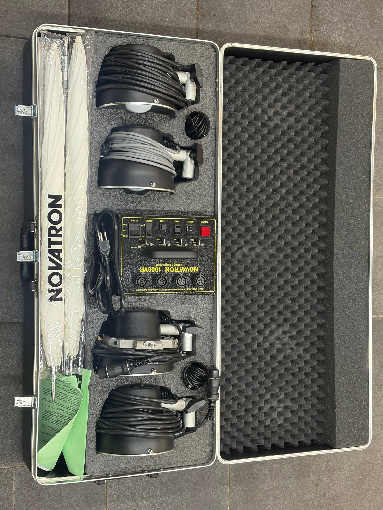 Novatron 1000 Photo Lighting Photography 4 Lights Strobe Studio: Upgrade your photography studio with this Novatron 1000 Professional Strobe Lighting System. Designed for portrait commercial product and studio photography this powerful setup includes four strobe li