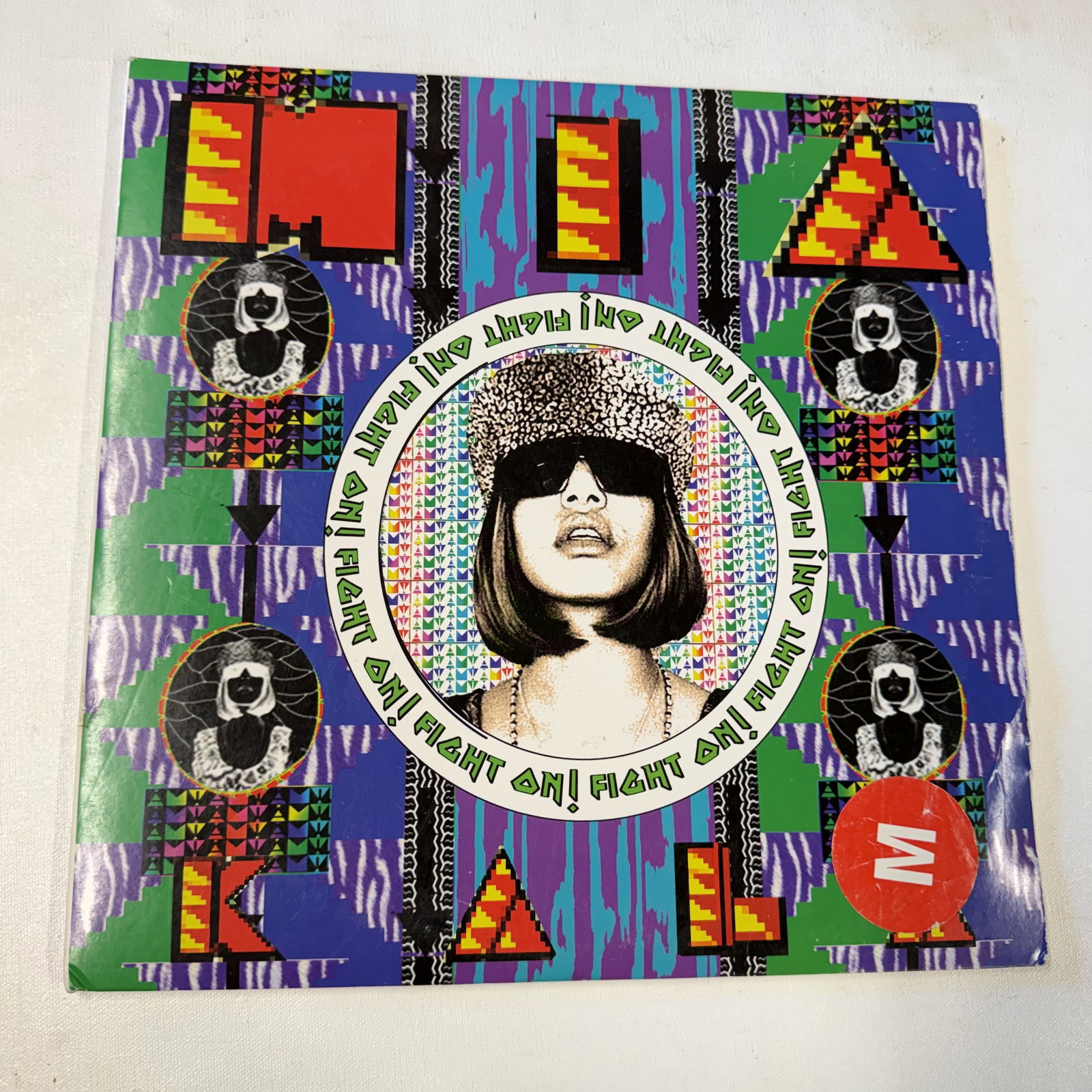 Vinyl Record M.I.A. Kala: Overall good - Vinyl: good - Cover: good - has been cleaned - Ships in a standard LP box with plastic sleeve - Combined shipping: y