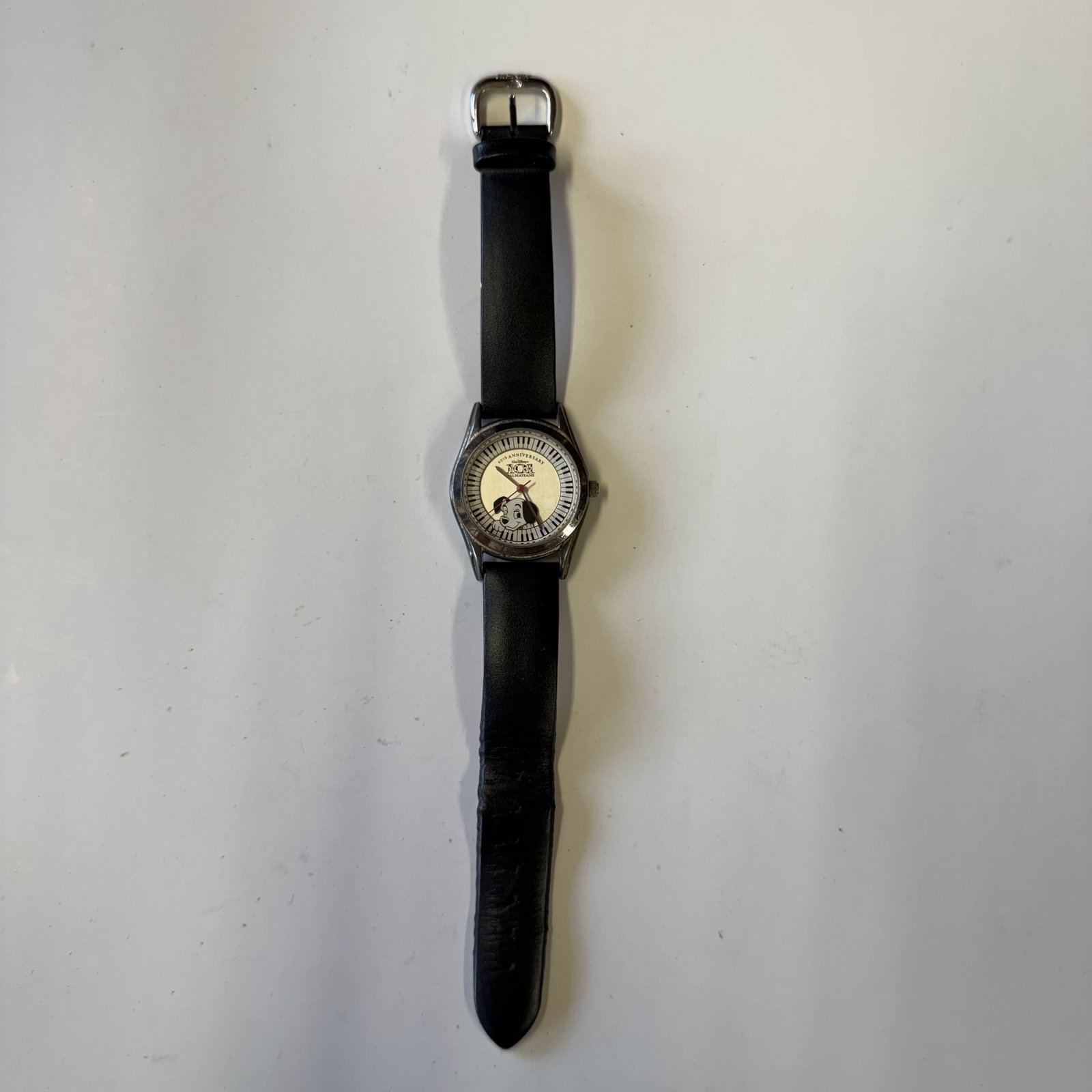 Disney Watch: Dalmations: Overall fair - Item is not working - need battery - strap is worn - AS-IS - Combined shipping: yes