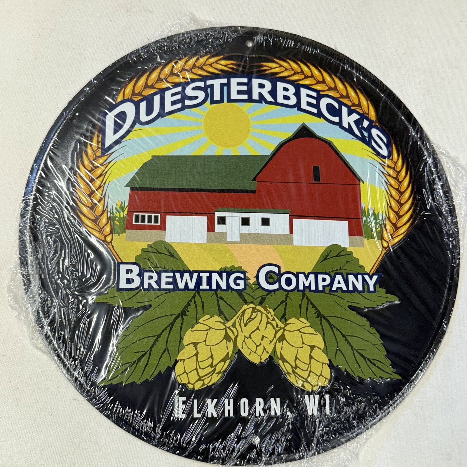 Round Metal Beer Sign for the Man Cave: Round and like new.