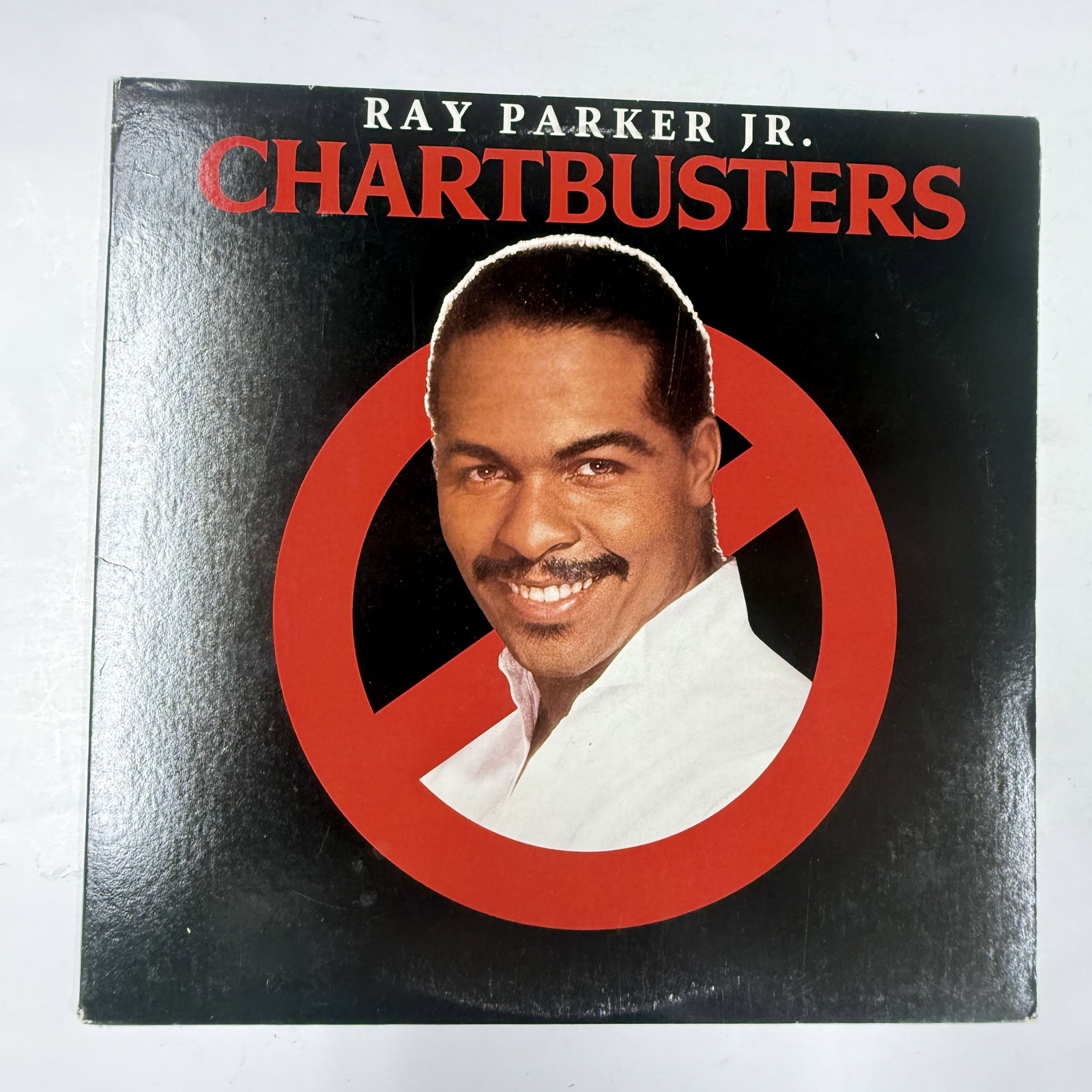 Soundtrackish Vinyl Record: Ray Parker Jr Chartbusters: Cleaned for good measure - ships in an LP box with plastic sleeve - Combined shipping offered.