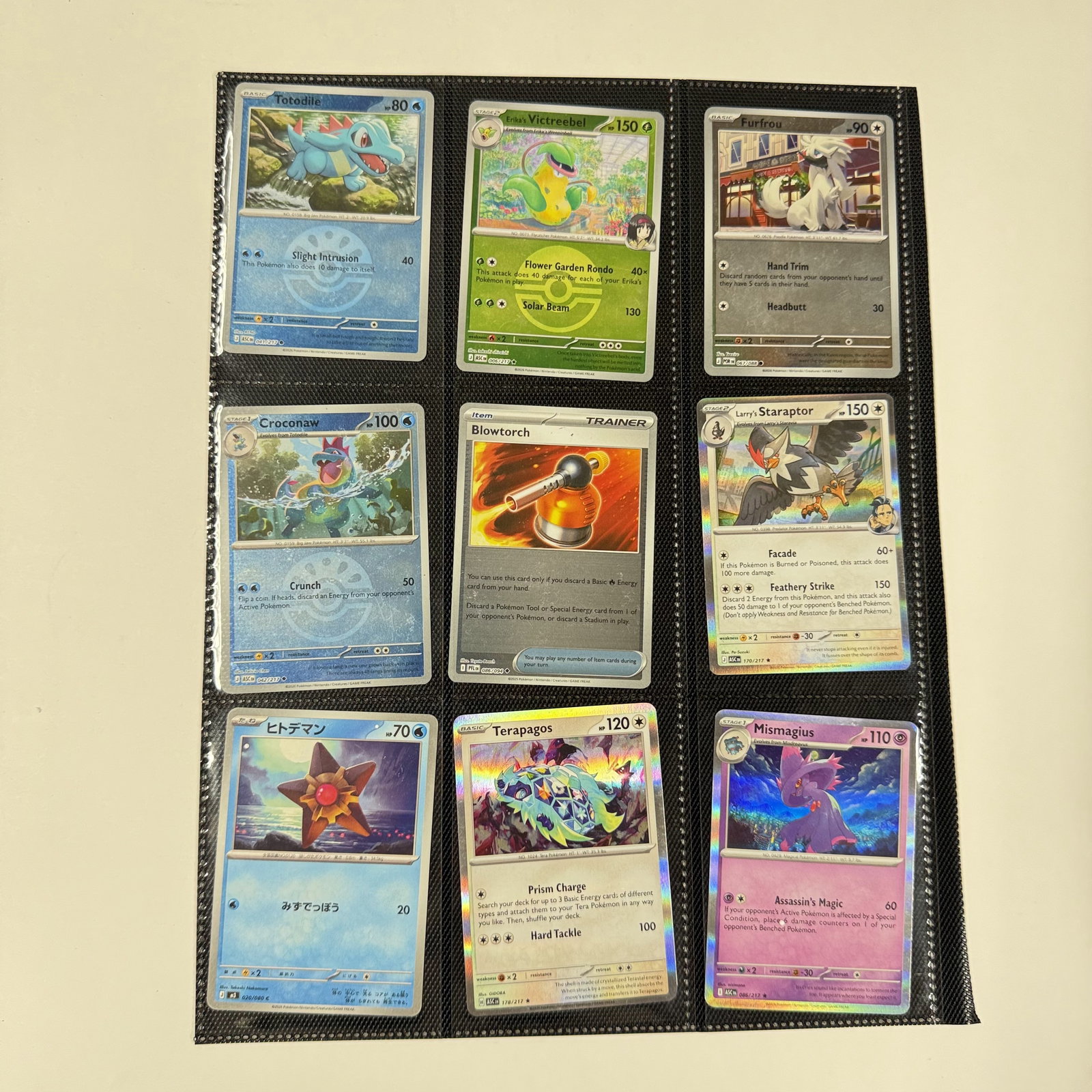 Pokémon Trading Card Lot: A random mix of cards in a binder page. Look at both sides of the page for contents. Combined shipping: encouraged.