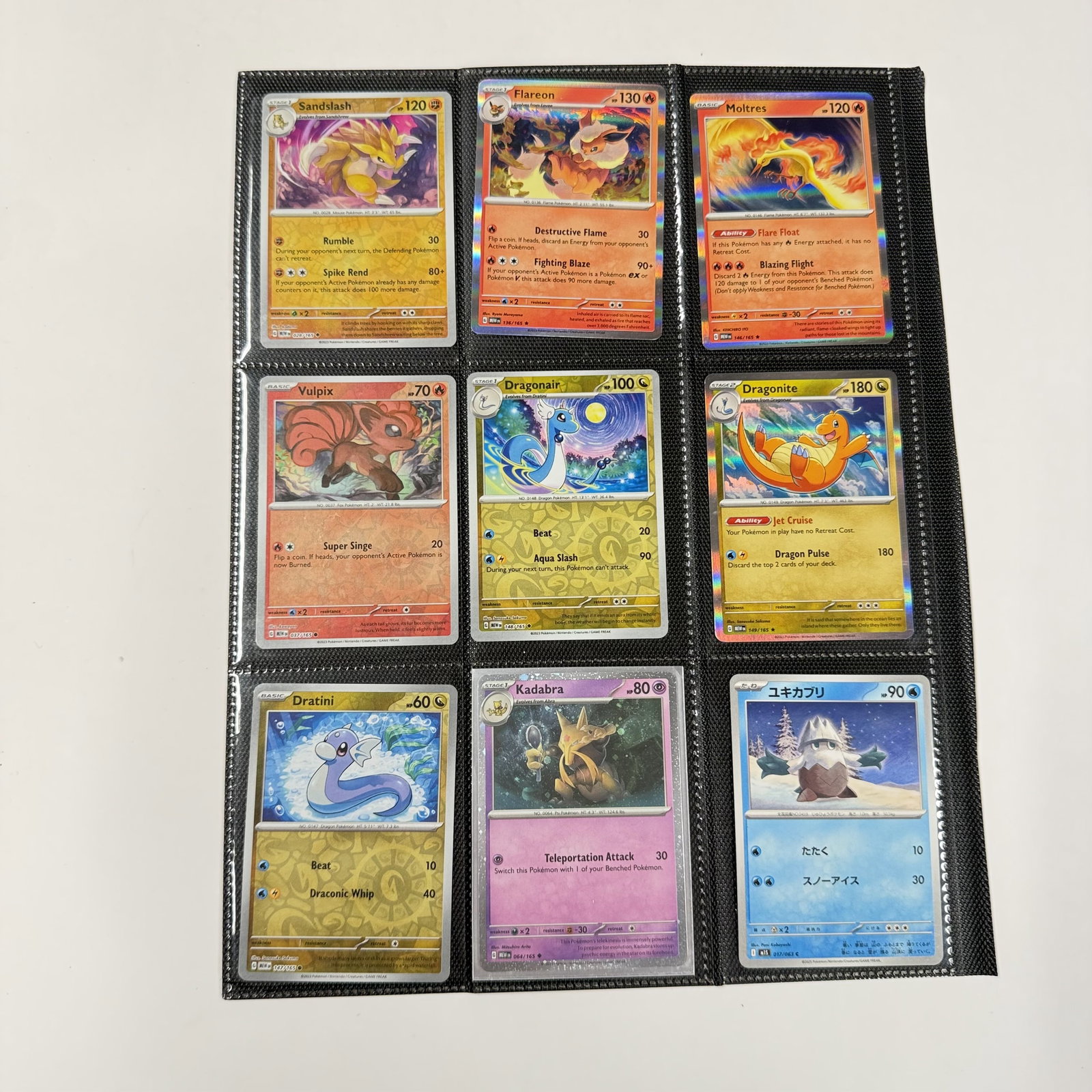 Pokémon Trading Card Lot: A random mix of cards in a binder page. Look at both sides of the page for contents. Combined shipping: encouraged.