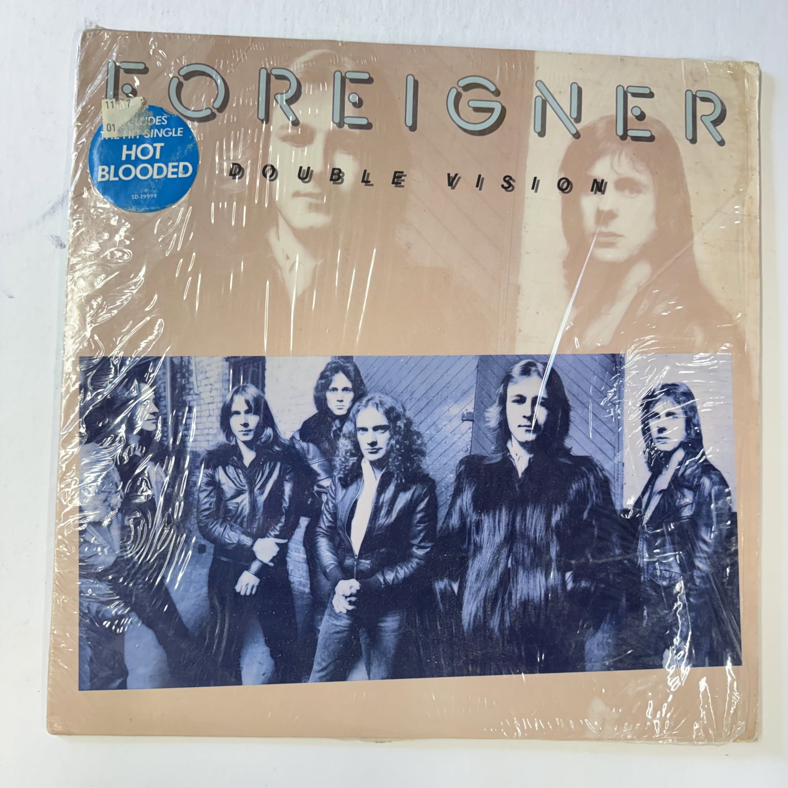 Rock Vinyl Record: Foreigner DBL Vision: Combined Shipping: yes - Ships in a LP box with plastic sleeve